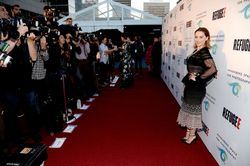 26981675_Emilia-Clarke--REFUGEE-Exhibit-