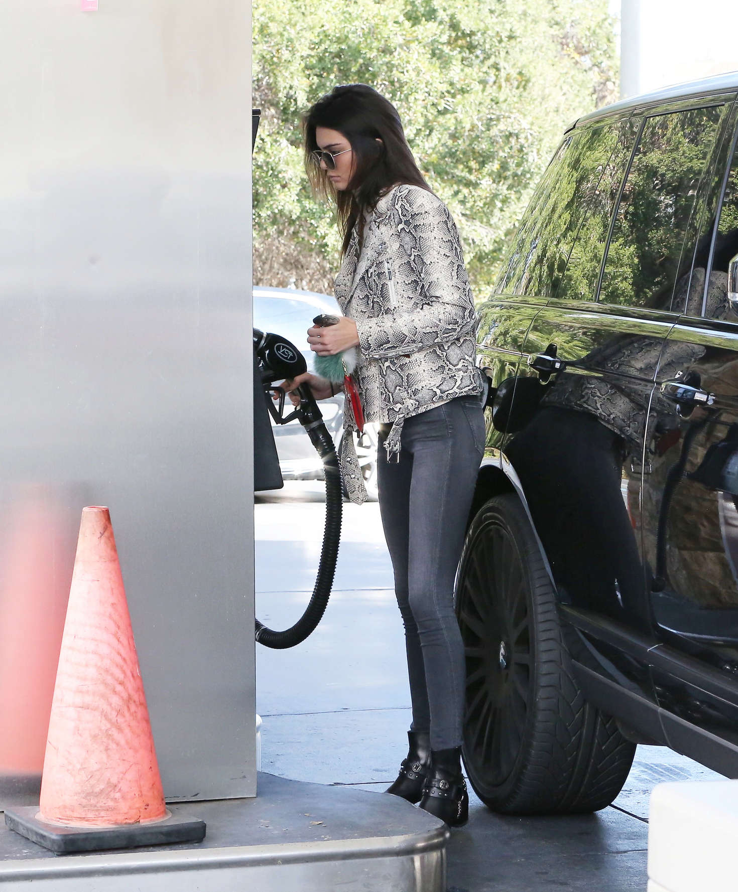 Kendall Jenner pumping gas 25