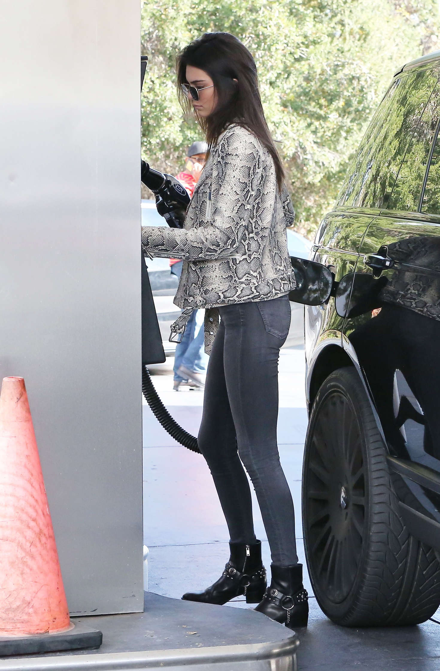 Kendall Jenner pumping gas 05