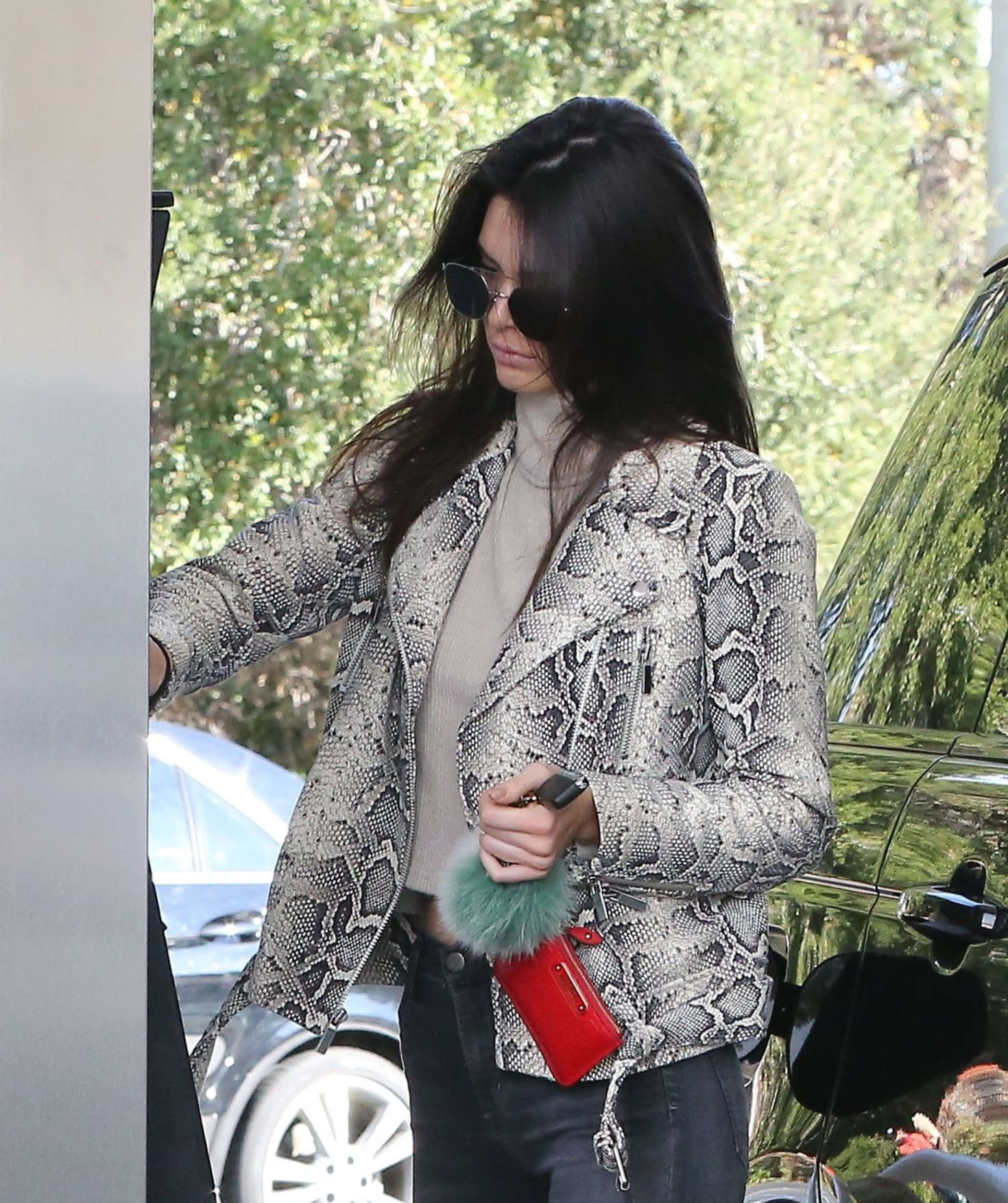 Kendall Jenner pumping gas 33
