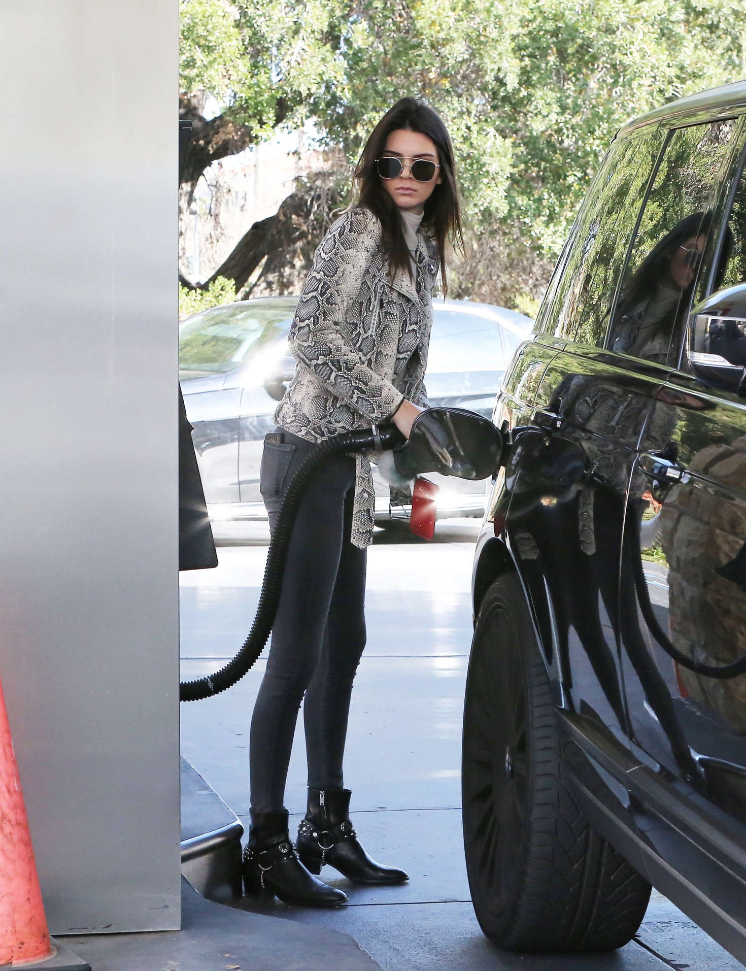 Kendall Jenner pumping gas 35