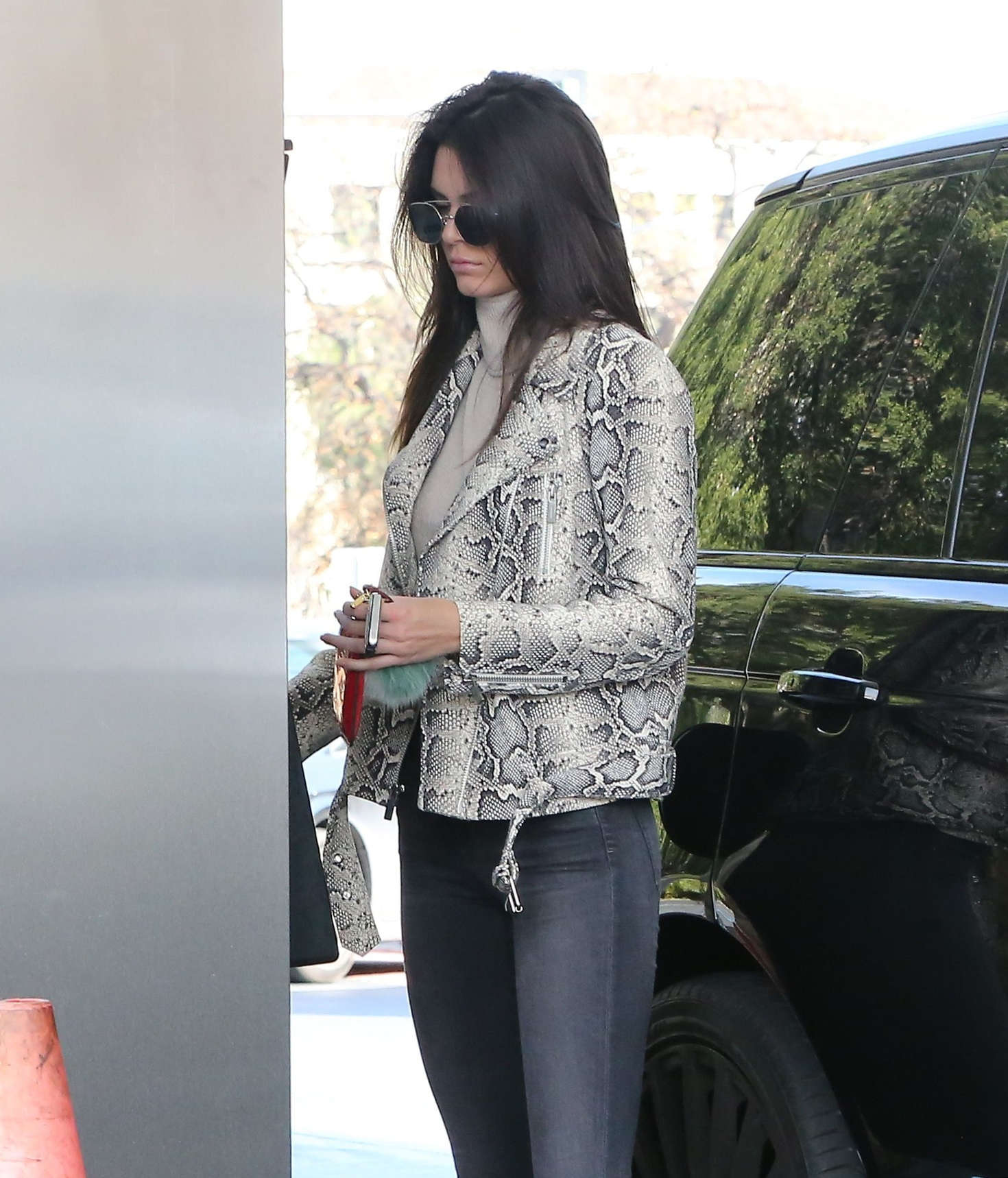 Kendall Jenner pumping gas 32
