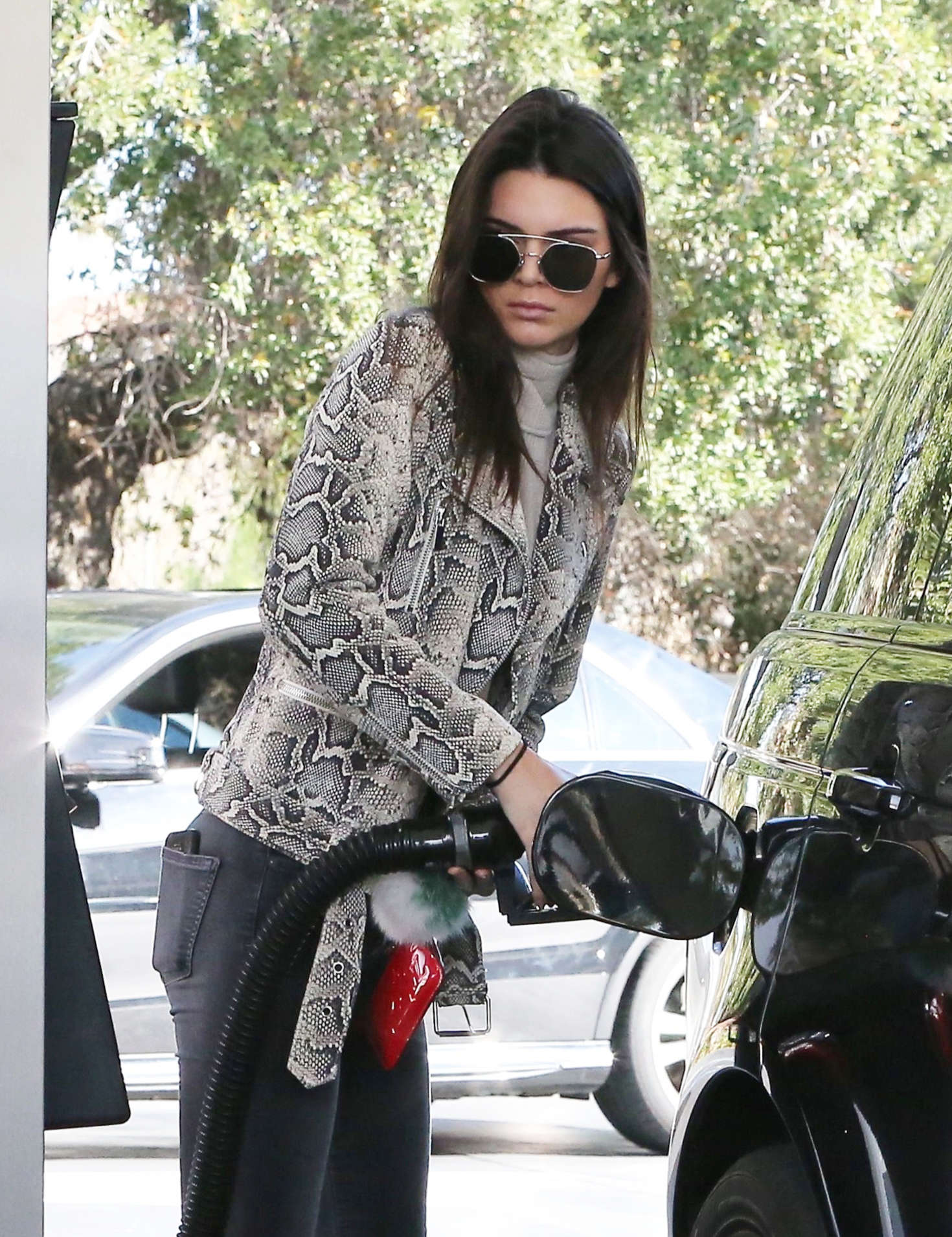 Kendall Jenner pumping gas 22