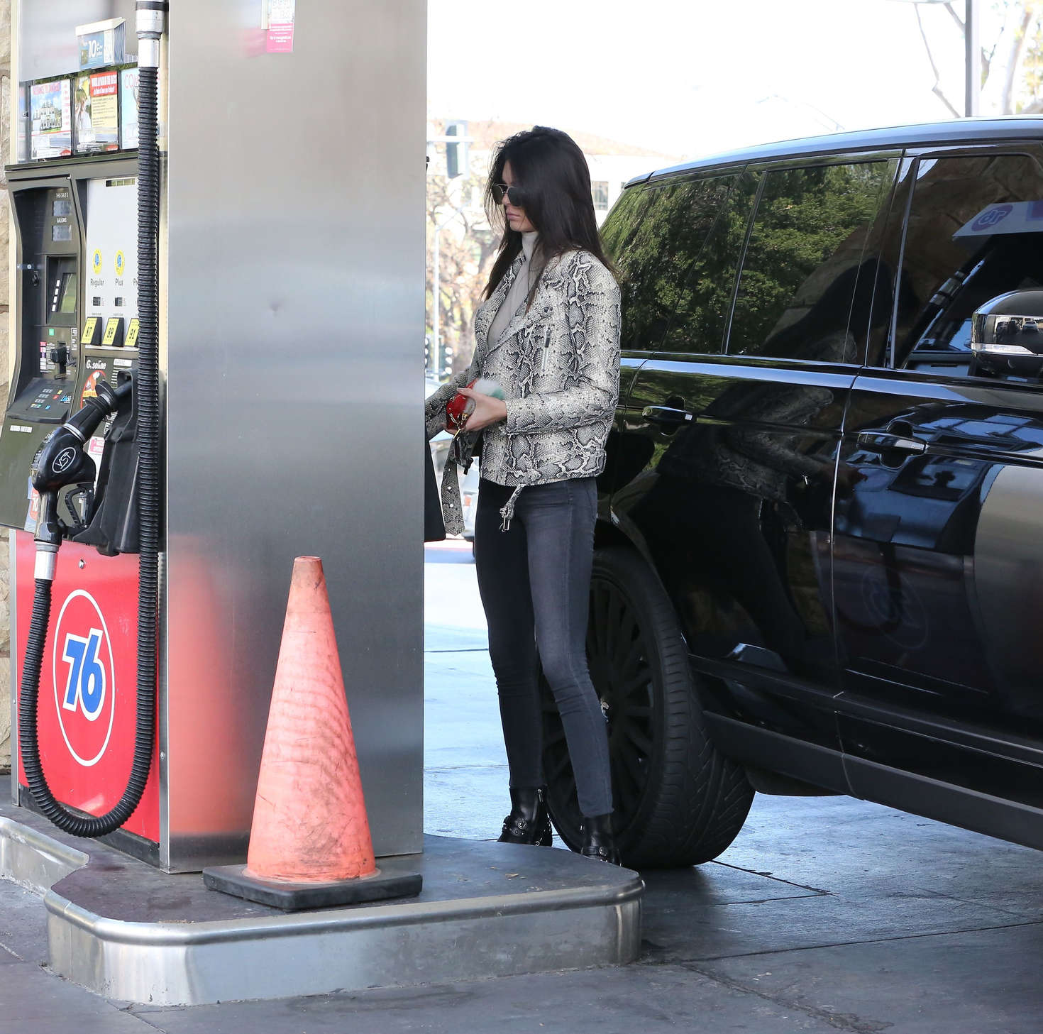 Kendall Jenner pumping gas 14