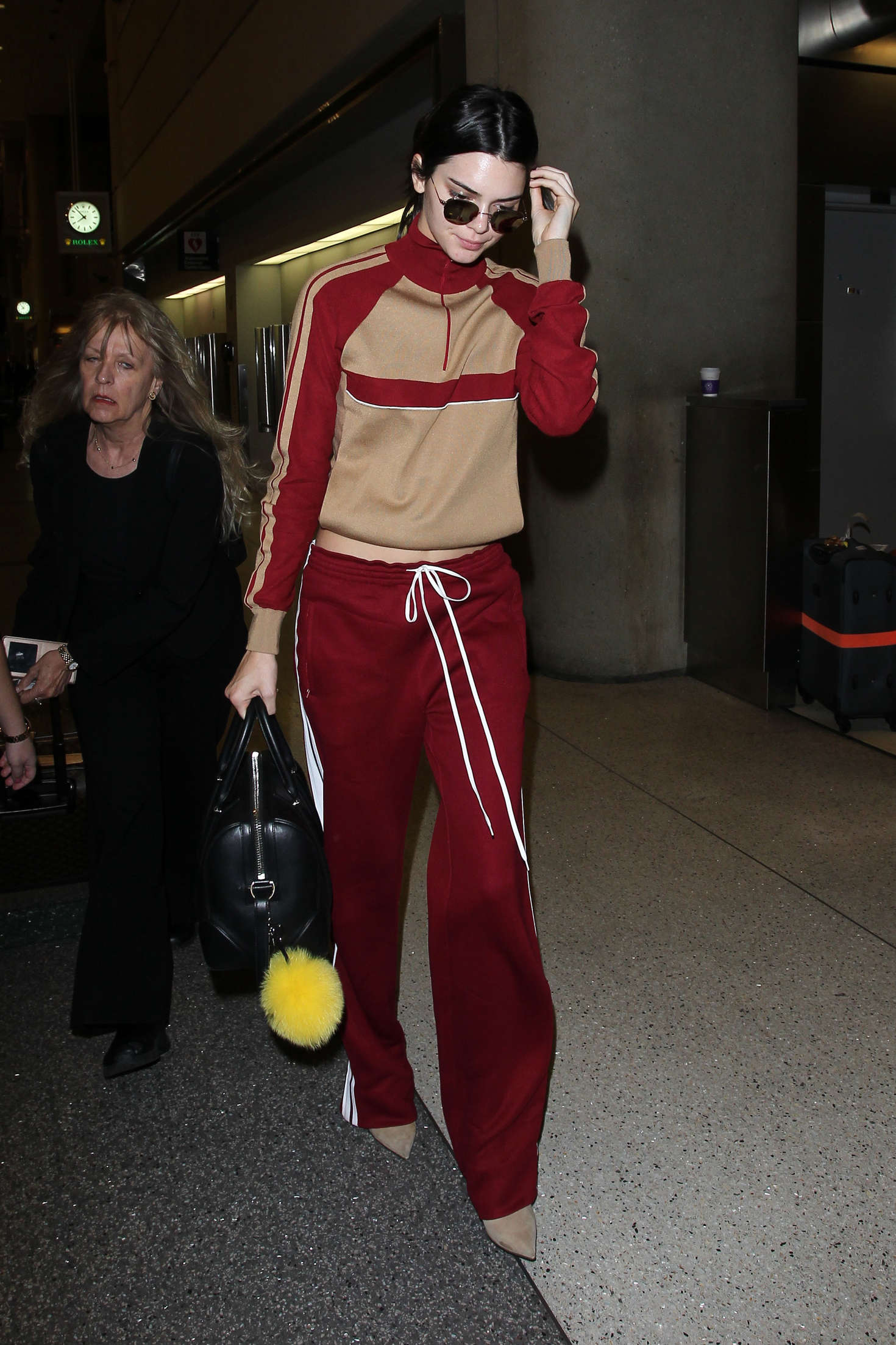 Kendall Jenner in Red Sweats at LAX 09