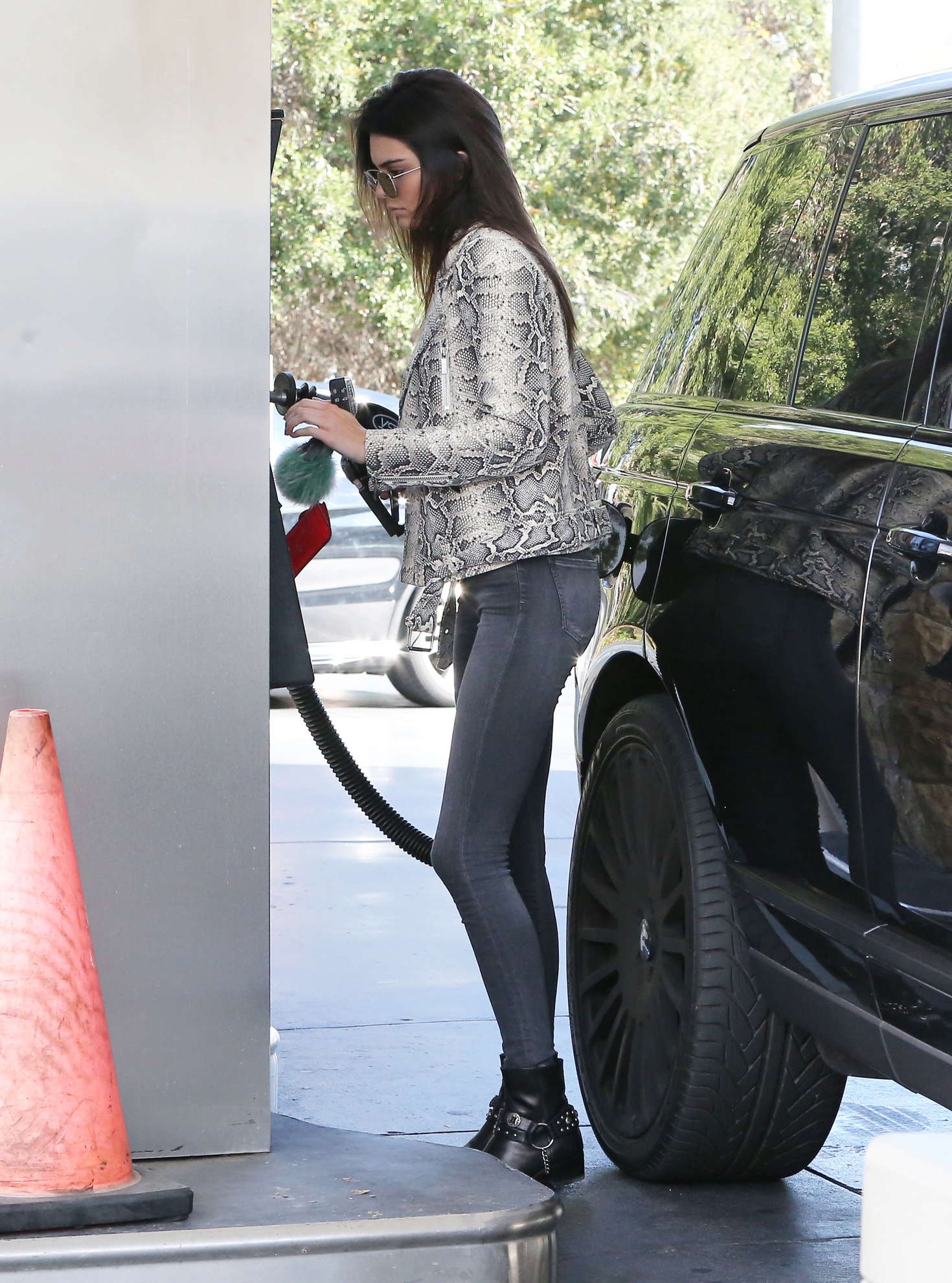 Kendall Jenner pumping gas 21