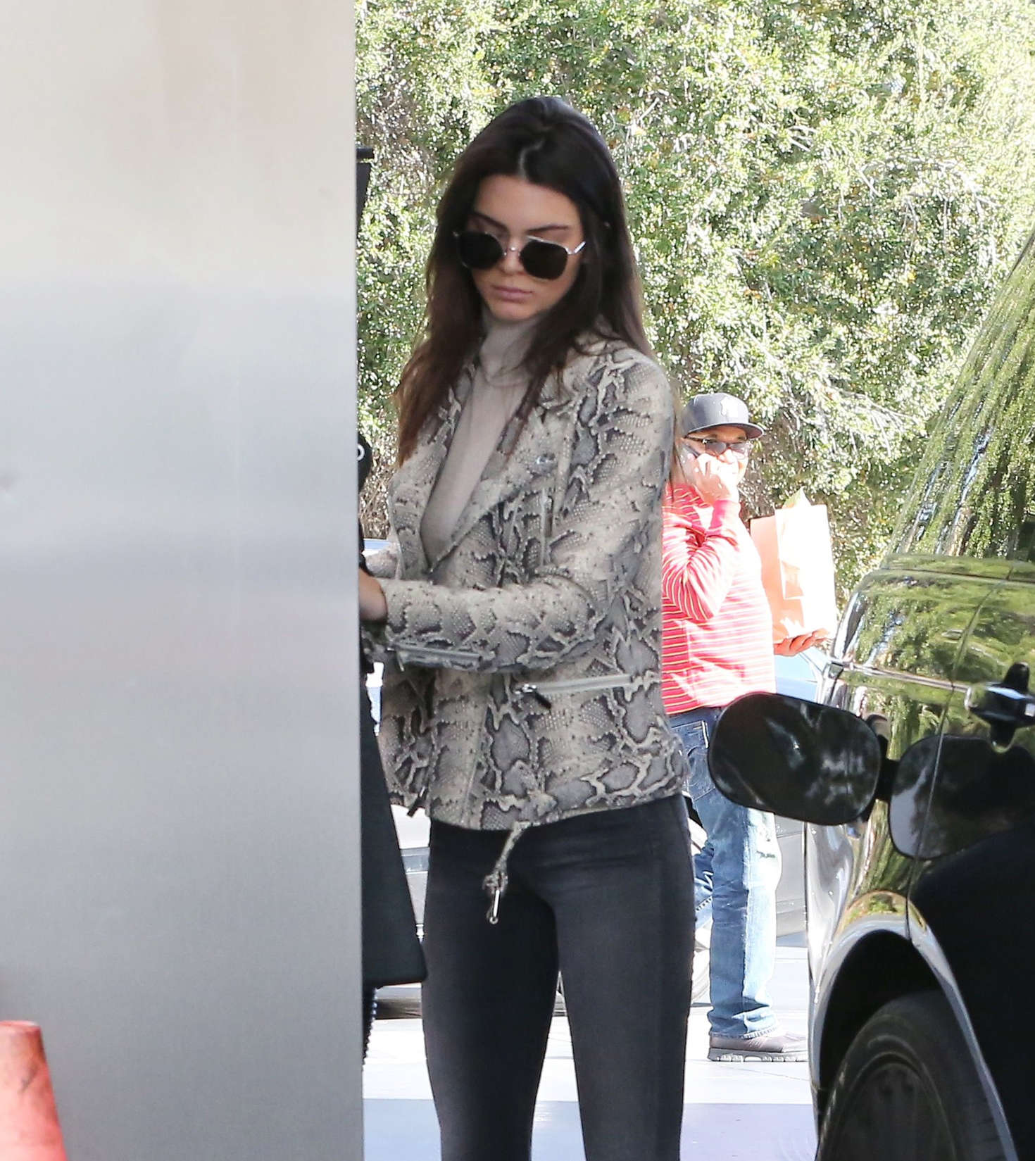 Kendall Jenner pumping gas 31